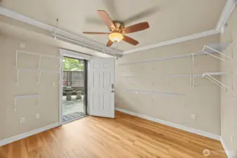 Third bedroom with door to courtyard.  Previously used as sewing room.