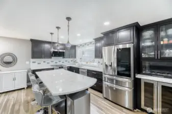 Island counter great for food prep and buffet.