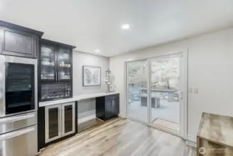 Counter set up for entertainment for both inside and access to large trec deck.