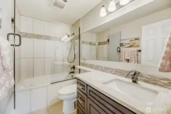 Full bath with jacuzzi tub and shower.