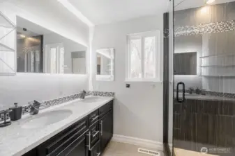 Main floor prime 3/4 bath. Totally updated with recess lighting in the mirror. Large rain shower head and side shower heads.