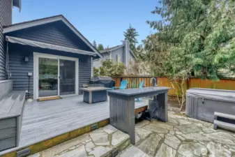 Step out from the kitchen to an entertainment size trec deck with electronic awning.