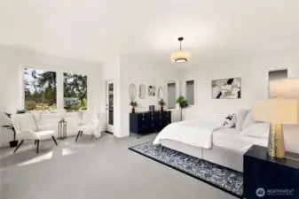 Natural light filled primary bedroom