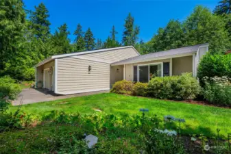 This gracious home sits in the middle of a park-like setting, wrapped in nature and serenity!