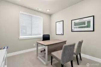 Main floor bedroom/office/den with a closet