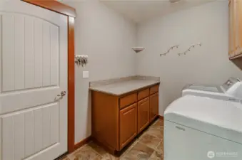 Laundry room right where it's supposed to be, between the garage and the kitchen! This way it serves as a mudroom, too!