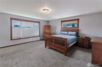 Primary bedroom has lots of room and an additional closet and more great views!