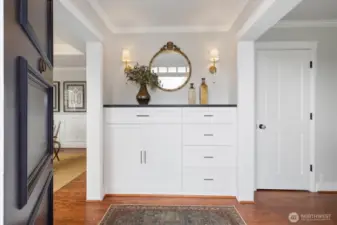 Custom cabinetry with Granite Ebony/Negresco Honed countertop, Camille Sconces by Suzanne Kasler, coffered ceiling with Antique-Burnished Brass with Alabaster stone flush Mount light and an Antique Mirror