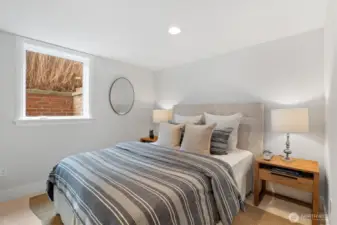 The fifth bedroom, located on the lower level, offers a private and comfortable retreat—ideal for an au pair, live-in nanny, or extended-stay guests.
