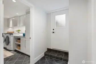 Access to the backyard and two car garage.