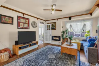 Light and bright living room with electric fireplace