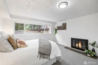 ADU primary bedroom w/fireplace