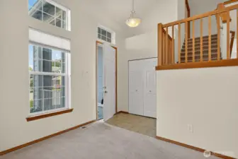 Bright entry way with coat closet