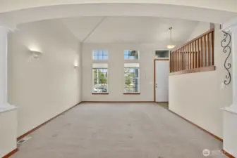 Living room with vaulted ceilings