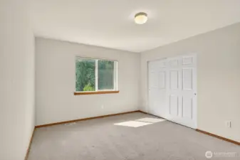Second additional upstairs bedroom with large closet