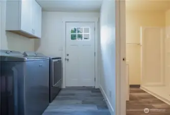 Hall bathroom and laundry off of the back door