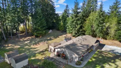 Aerial shot. Hard to find private setting on over an acre with NO HOA.