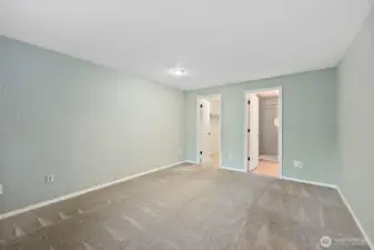 Walking into the primary bedroom suite