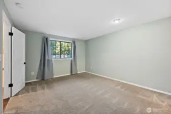 Primary suite overlooking the front yard.