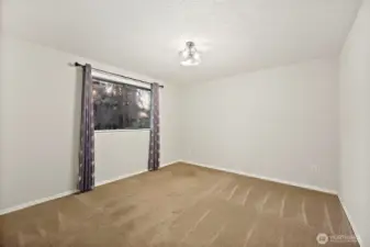 Bedroom #2 with carpeted flooring