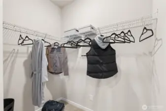 Large walk-in closet for off the primary bedroom. Actual home is under construction. Colors, materials, and features may vary. See site agent for details.