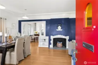 The hearth (decommissioned) welcomes you into this home and all the old world charm.