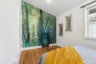 The mural has been with the home for many years and the secret door goes to the bathroom.