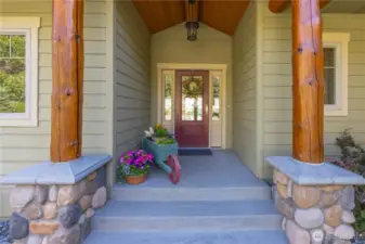 Log Posts & Wood Soffits Accent Covered Porch