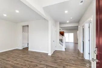 Bright and grand entrance open to above allowing a ton of natural light. Photos are for representational purposes only. Some colors and finishes may differ.