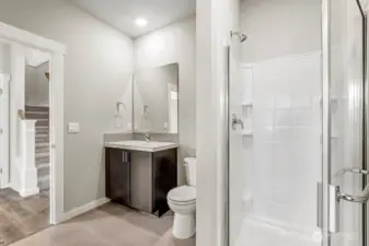 Shower on the main floor because we gave a bedroom on the main. Photos are for representational purposes only. Some colors and finishes may differ.