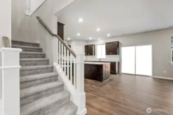 Open rail on the staircase for that formal finish. Photos are for representational purposes only. Some colors and finishes may differ.