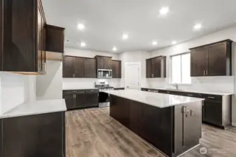Quartz counters with undermount sink. Photos are for representational purposes only. Some colors and finishes may differ.