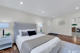 Primary bedroom retreat with fresh finishes and calming views.