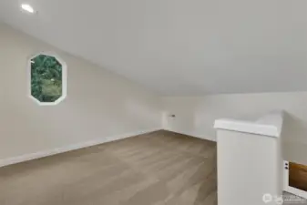 Bonus loft bedroom, perfect for guests, a playroom, or creative space.