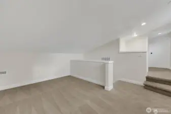 Bonus loft bedroom, perfect for guests, a playroom, or creative space.