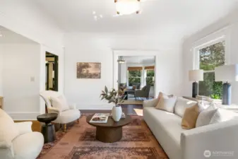 Elegant living room with large south facing windows to let in loads of light