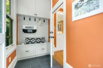 The generous mudroom at the back entry makes everyday living easy with built-in storage and cozy nooks for all the extras.