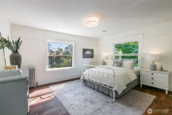 Southwest corner bedroom looks out to back and side yards