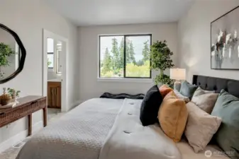 Bedroom with en-suite bath downstairs 1/2 bath (model home lot 1A, colors may vary)