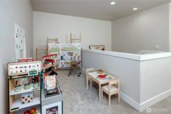 Den located upstairs- perfect for home office, play area, & more! (model home lot 1A, colors may vary)