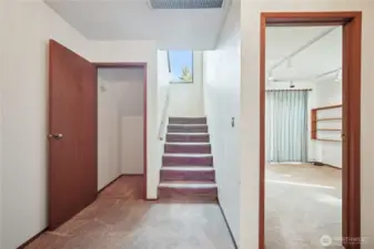 Stairs from main floor to lower level w/bedrooms.