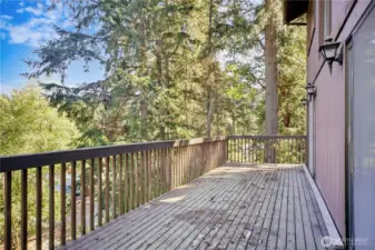 Deck off of bedrooms.  Just needs to be re-stained.