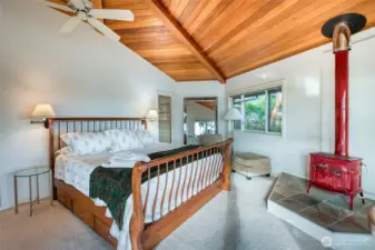 A propane stove makes a comfy addition to the primary suite.