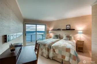 The third bedroom has an ensuite full bathroom and another personal deck.