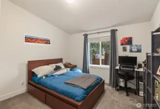Secondary bedroom with closet space and flexibility for guests, office, or hobbies.