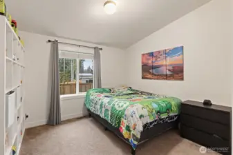 Additional bedroom with natural light and adaptable layout for a variety of needs.