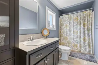 En suite bathroom off of the primary bedroom.