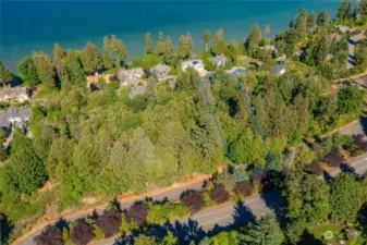 Lines are for general idea of lines only with Lot 17 5510 is over a half acre homesite+/- single family homesite. Puffin place is a private road and gated. Elevated panoramic view site, with views well over the homes.