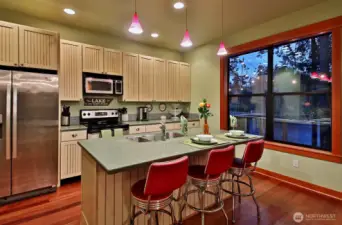 Sit up counter and SS appliances.