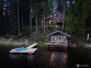 Newer marine dock. Boat house with power and deck.